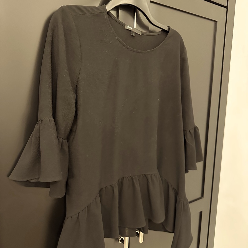 Ruffle edge top in black chiffon